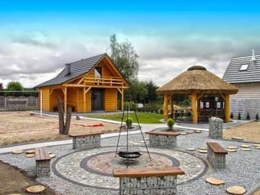 A wooden eco-friendly house by the Goszcza lake. Living room 2 bedrooms.