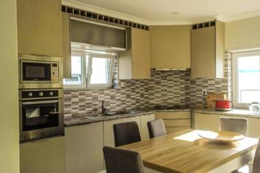 4 bedrooms house with shared pool enclosed garden and wifi at Atalaia 3 km away from the beach