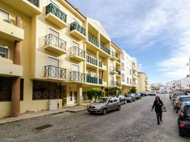 This warm and comfortable apartment is located just outside the city of Lagos.