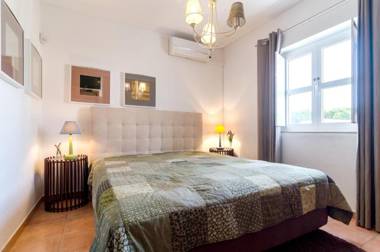 3 bedrooms house with shared pool enclosed garden and wifi at Vilamoura 3 km away from the beach