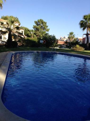 3 bedrooms house with shared pool enclosed garden and wifi at Vilamoura 3 km away from the beach