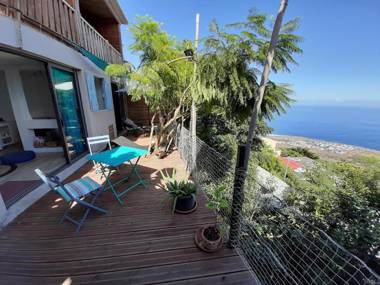 Bungalow d'une chambre avec vue sur la mer piscine partagee et jardin clos a Saint Leu a 7 km de la plage