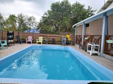 Villa de 4 chambres avec piscine partagee terrasse amenagee et wifi a Le Tampon