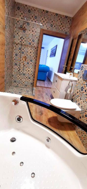 Canti jacuzzi apartments