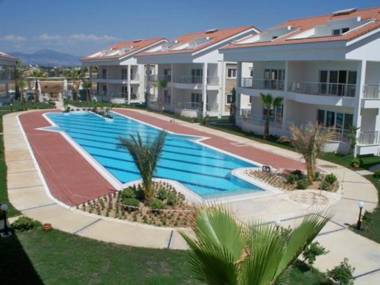 Gorgeous 2 Bed Private Ground Floor Home In One Of Sides Most Exclusive Communi