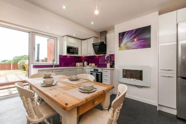 Modern Home with Garden and Farmland Views