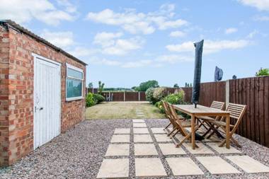 Modern Home with Garden and Farmland Views