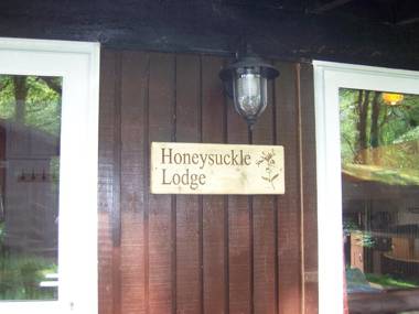 Honeysuckle Lodge set in a Beautiful 24 acre Woodland Holiday Park