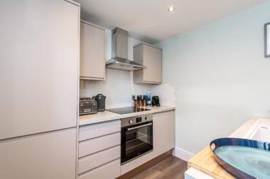 Charming 3-Bedroom Coach House with Free Attached Garage!