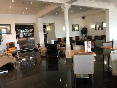 OYO The Strand Hotel