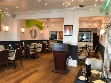 OYO The Strand Hotel