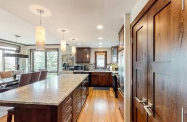 Spacious Ski in Ski out 3 Bedroom Vacation Rental Next to the Gondola Featuring Slopeside Heated Outdoor Pool and Hot Tub