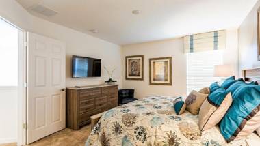 Palm Golf- 6 Bedroom Home with a south facing pool relaxing spa and game room in a gated resort