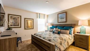 Palm Golf- 6 Bedroom Home with a south facing pool relaxing spa and game room in a gated resort