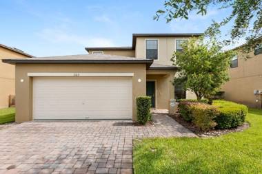 Cypress Pointe- Contemporary Villa in a gated community with a game room