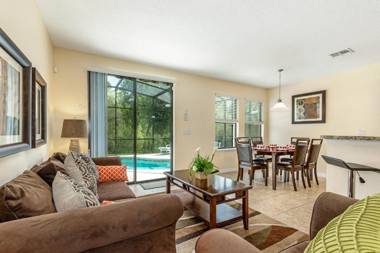 Cypress Pointe- Contemporary Villa in a gated community with a game room