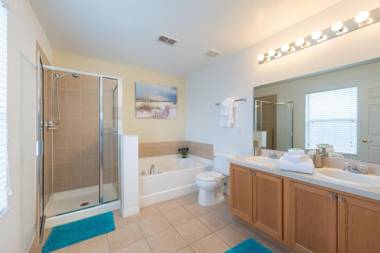 Disney Retreat- 5 bedroom vacation home with 3 seperate living areas a private pool and spa and game room