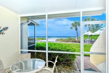 LaPlaya 101A Step out to the beach from your screened lanai Light and bright end unit