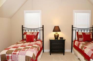 Enjoy our outdoor Tv and screened porch at Marina Cottage