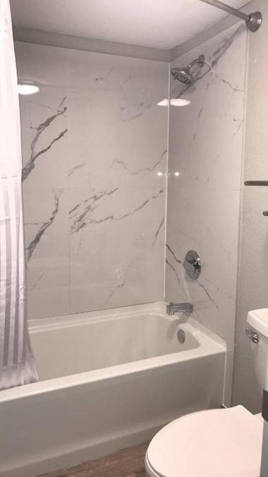 All Seasons Inn & Suites