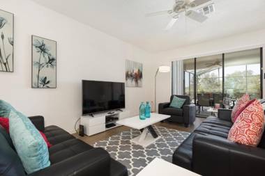 Victoria Villa- Modern 4 bedroom villa with a fully screened private pool with spa game room gas BBQ and resort amenities