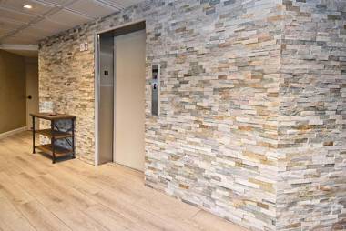 Our House at the Beach; by Beachside Management