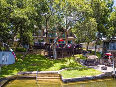 Lake LBJ Waterfront House w/ Private Boat Slip Swimming Area with Steps to the lake