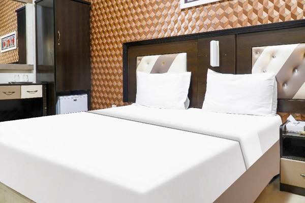 OYO 902 Prime Hotel Llc