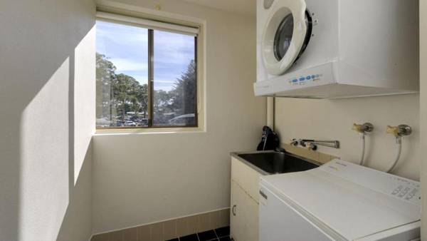 Right on the sands at Little Beach and walk to the heart of Nelson Bay