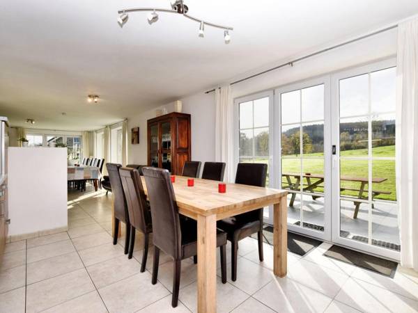 Detached natural stone house with sunny garden and terrace modern interior  