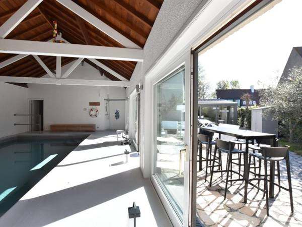 Charming villa with indoor swimming pool within walking distance from beach and town centre