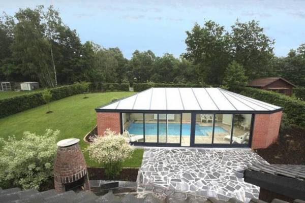Cottage with swimming pool comprises two separate parts