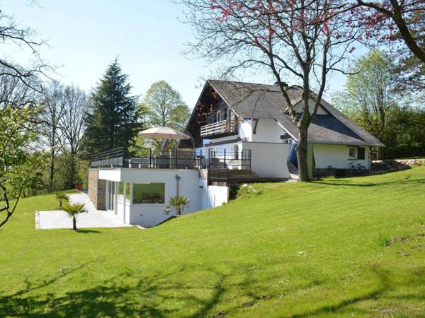 Stately Chalet in Stoumont with Pool & Sauna