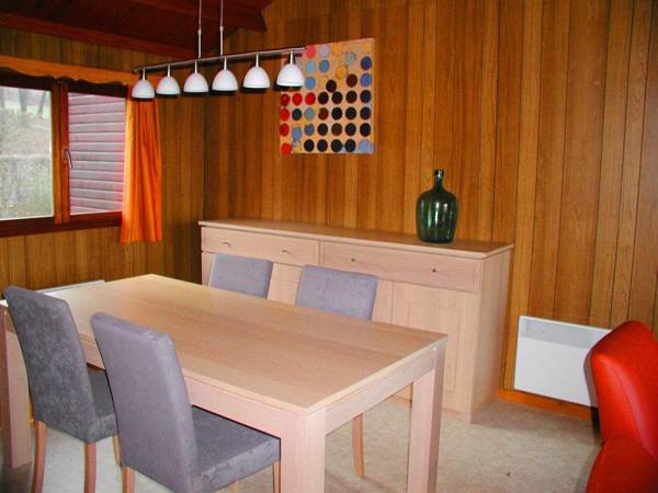 Cozy holiday home with an oven located in a green area