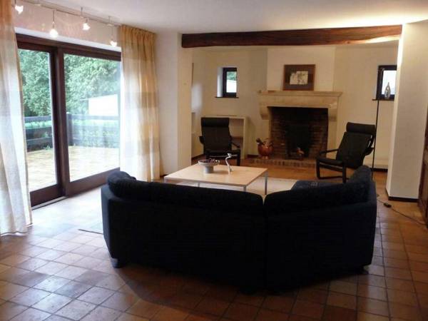 Family holiday home with beautiful garden beside the Ourthe and the RAVeL.