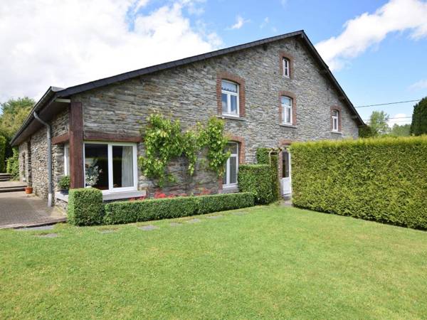 An old farmhouse in a peaceful Ardennes village on the edge of the forest