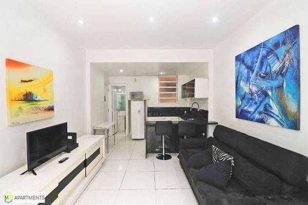 Studio moderno com vista lateral para o mar na quadra da praia em Copacabana!