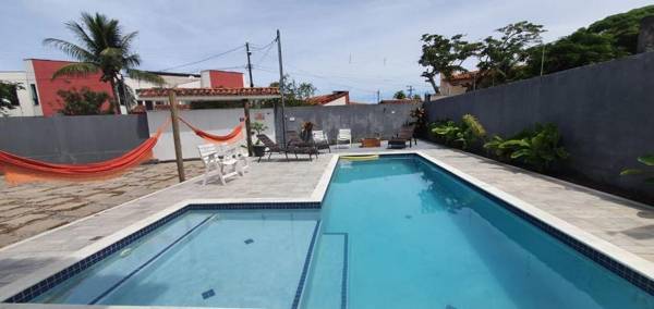 Casa dos Ipês com 3 suítes piscina área gourmet