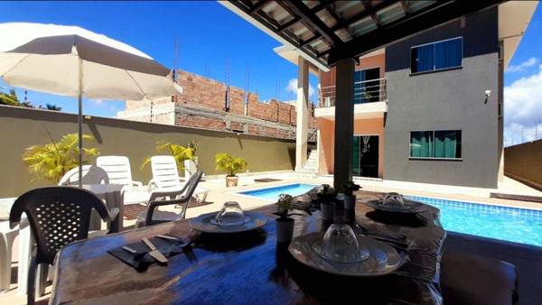 Casa Tocantins com 5 quartos piscina e churrasqueira para 16 pessoas