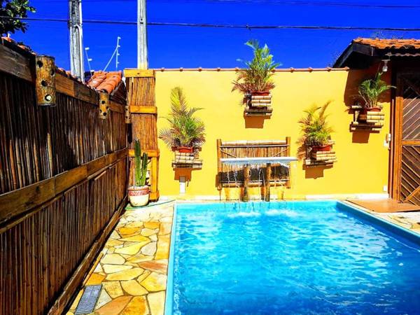 Casa linda com Piscina e Jogos pertinho da Praia
