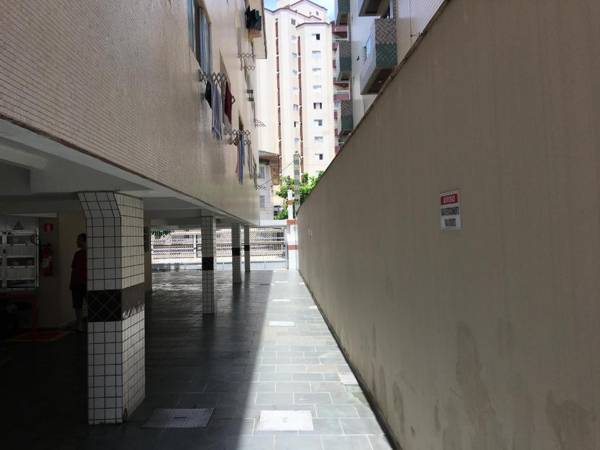 Pé na areia praia Guilhermina