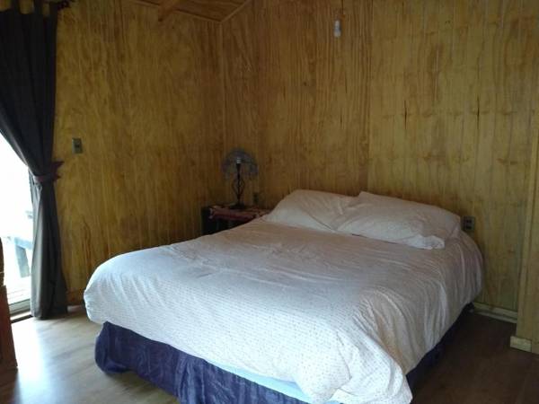 Cabaña entre Arboles