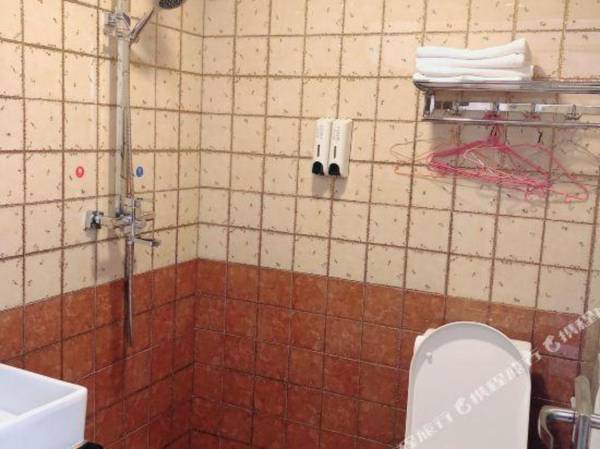 Qi Qi Ha Er Hua Tong Hotel