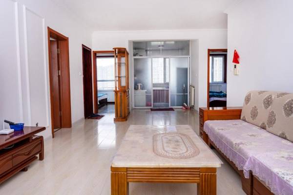 青岛金沙滩全家幸福三居室四床公寓Golden Beach Happiness Holiday Apartment