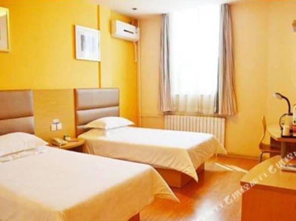 Grace Inn(Jiaozhou railway station RT Mart)