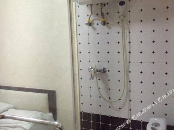 Mudanjiang Xinle Guesthouse Second Branch