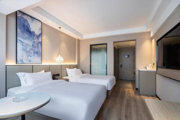 Xinhuating Business Hotel