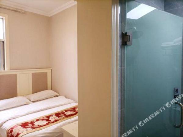 Kun Ming Qi Cai Hotel