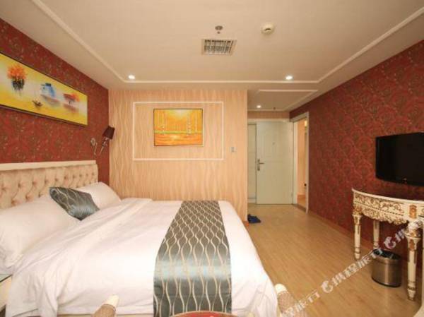 Carnation Business Hotel (Guangzhou Tongde Metro Station)