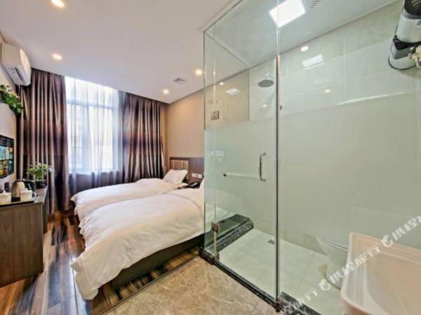 Qinglv Business Hotel